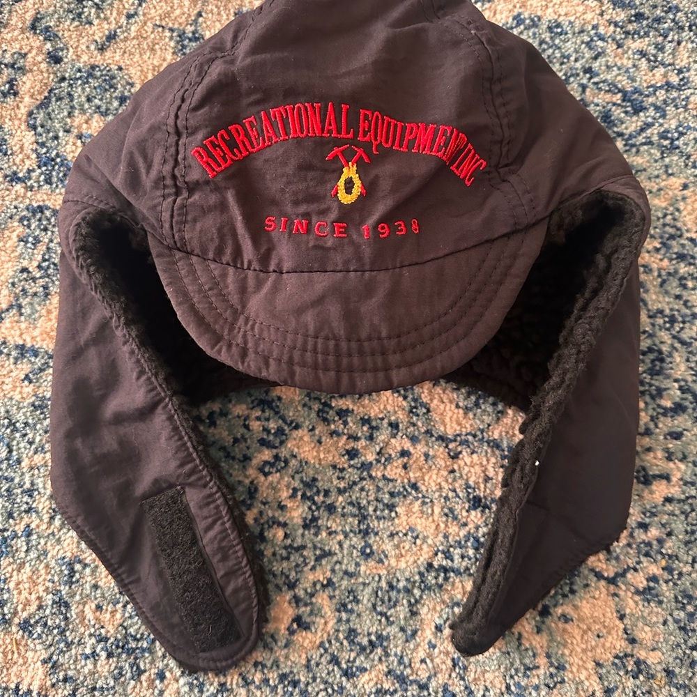REI Black Ear Flap Hat with Red Embroidery